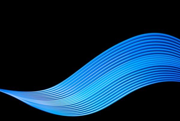 Technology banner design. Abstract neon waves on black background.