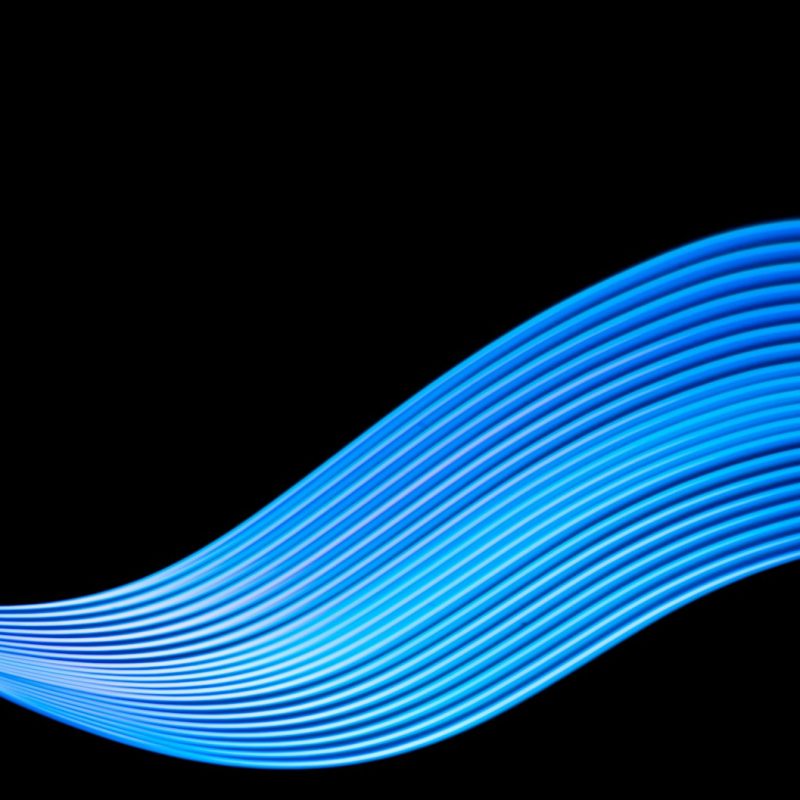 Technology banner design. Abstract neon waves on black background.